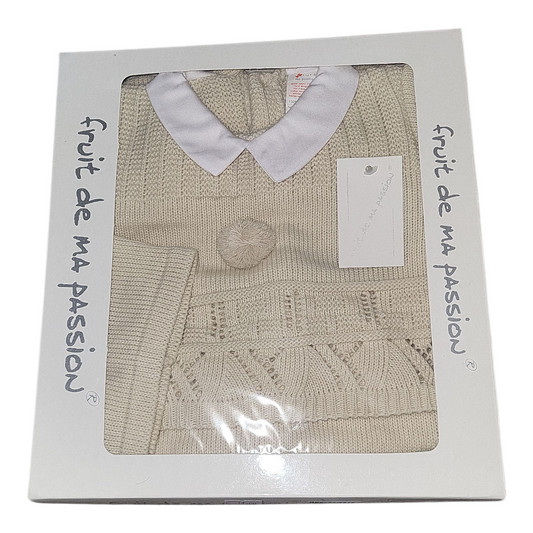 Beige sweater with white collar in packaging labeled 'fruit de ma passion'.