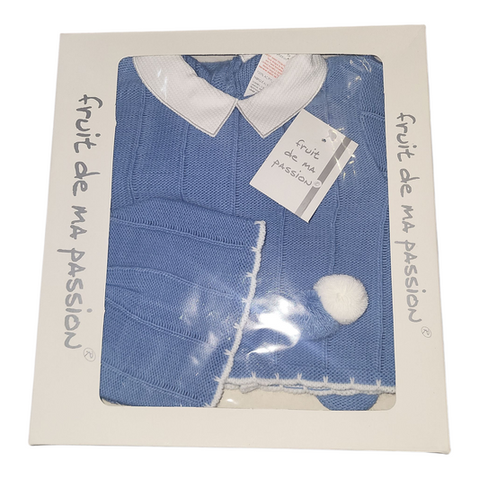 Blue knitted sweater with white collar and pom-pom on a branded card.