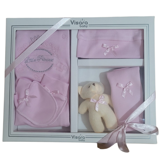 Baby gift set with pink baby clothes and a teddy bear in a Visara Baby box.