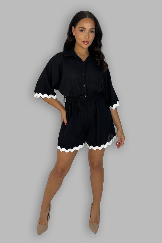 Women's Black And White French Lapel Front Buttoned Tie Waist Trim Detail Playsuit.